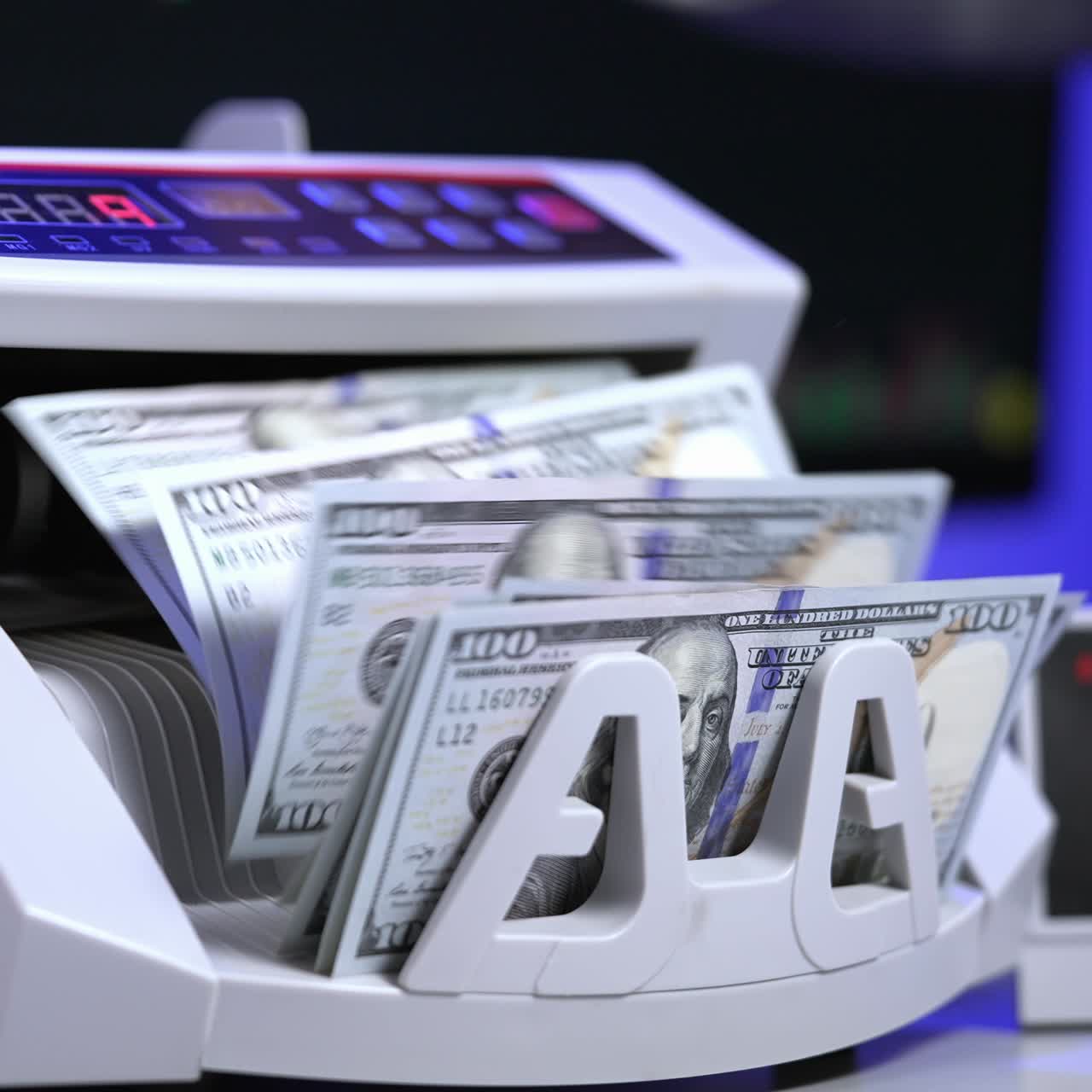 Counting operation on electronic cash machine. Counting money on bank automatic equipment. Paper banknotes in modern money counting machine. Investment capital operations