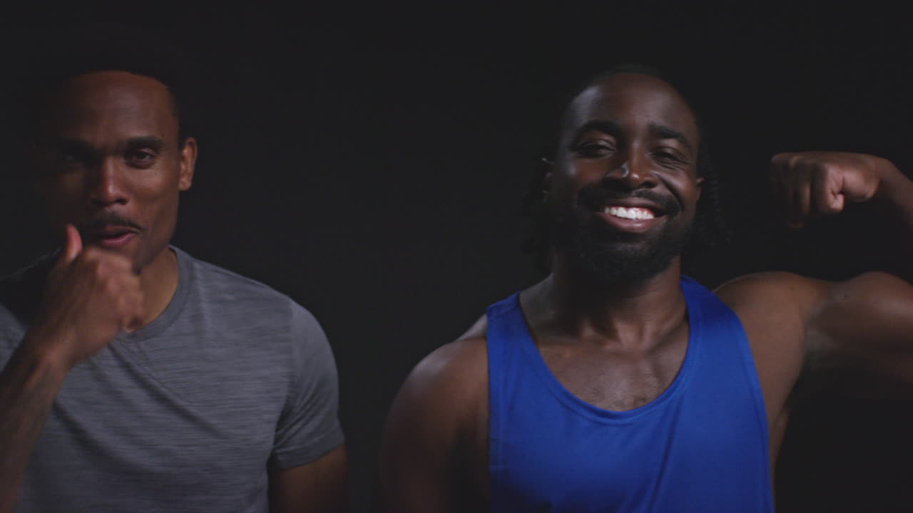 Two Smiling Men Working Out Together