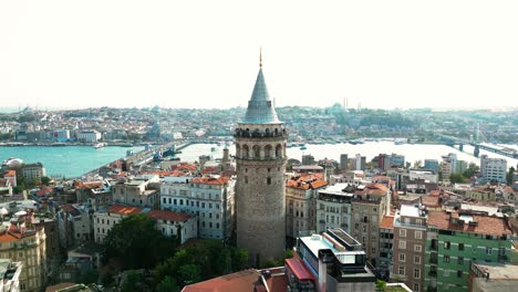 cinematic orbiting drone video of the galata tower in beyoglu district in istanbul, turkey