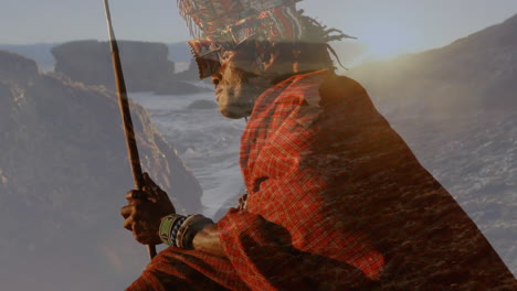 hombre nativo americano y vista del océano durante la puesta de sol