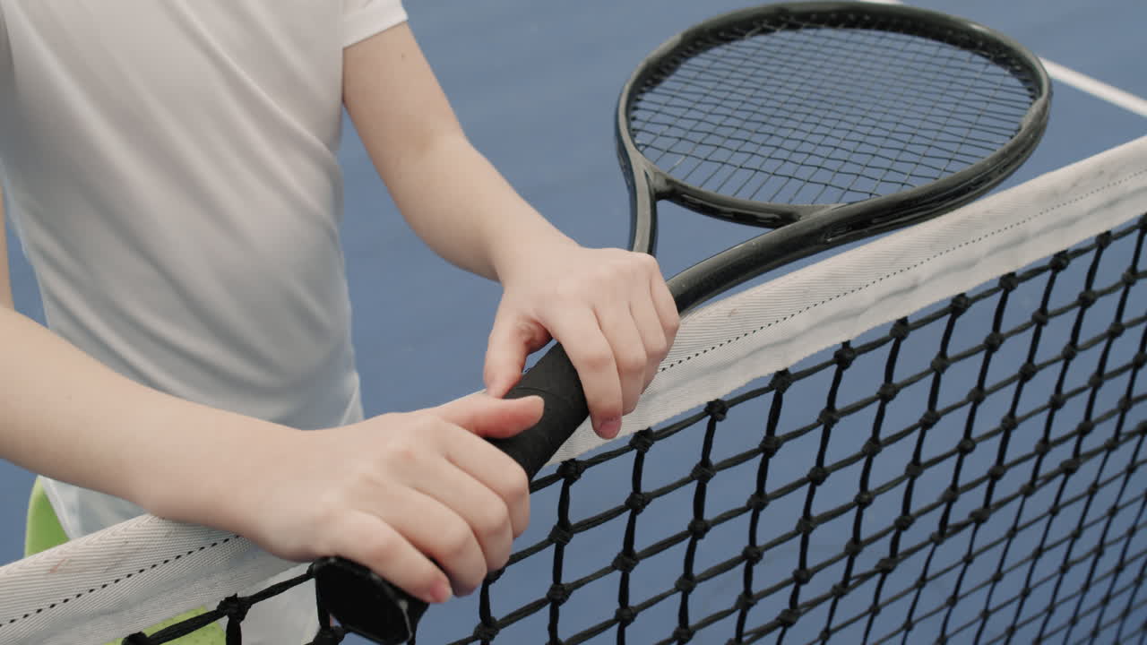 Unrecognizable Girl With Tennis Racket