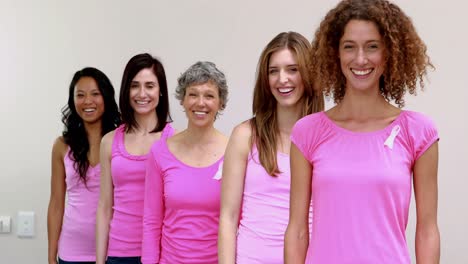 happy women standing in a row