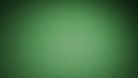 초록색 필트 위의 금색 주사위
