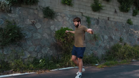 athlete warms up shoulders and legs before outdoor run