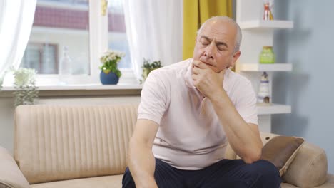 Thoughtful-and-unhappy-old-man-at-home.