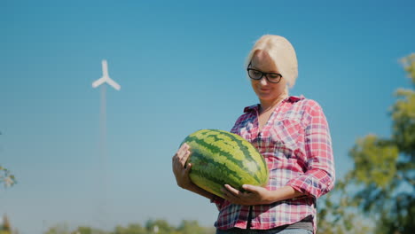 Woman-Holding-Watermelon-on-a-Farm