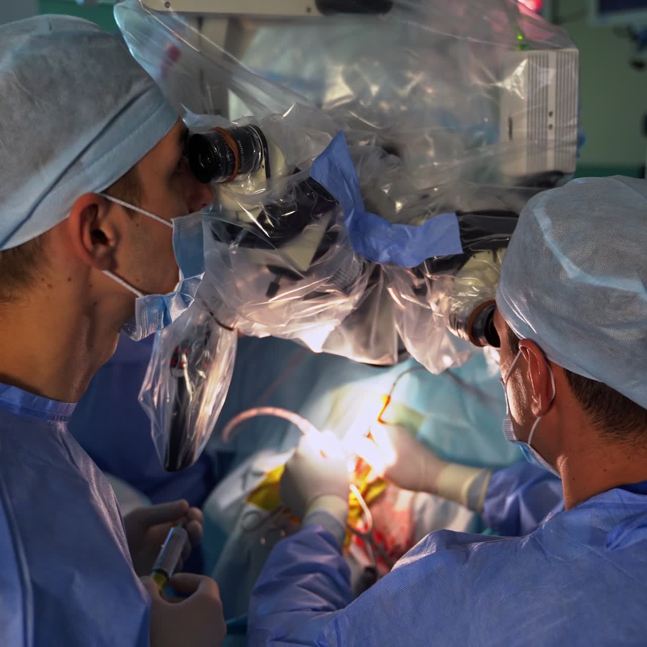 Professional neurosurgeons working in emergency room. Doctors in uniform processing operation