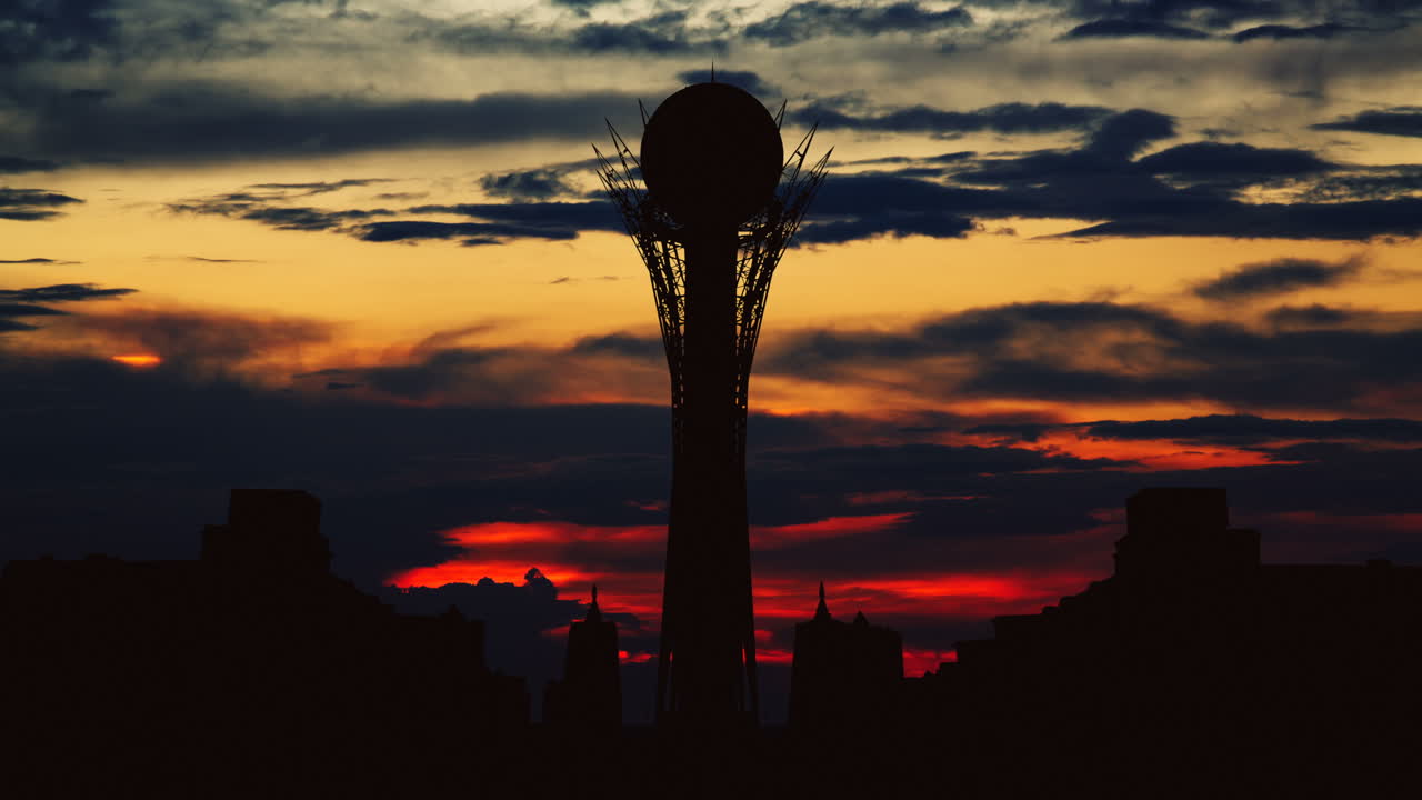 Silhouette of City at Sunrise/Sunset with Tower