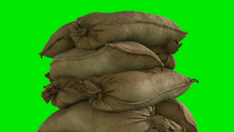 sandbags-for-flood-defense-or-military-use-on-green-chromakey-background