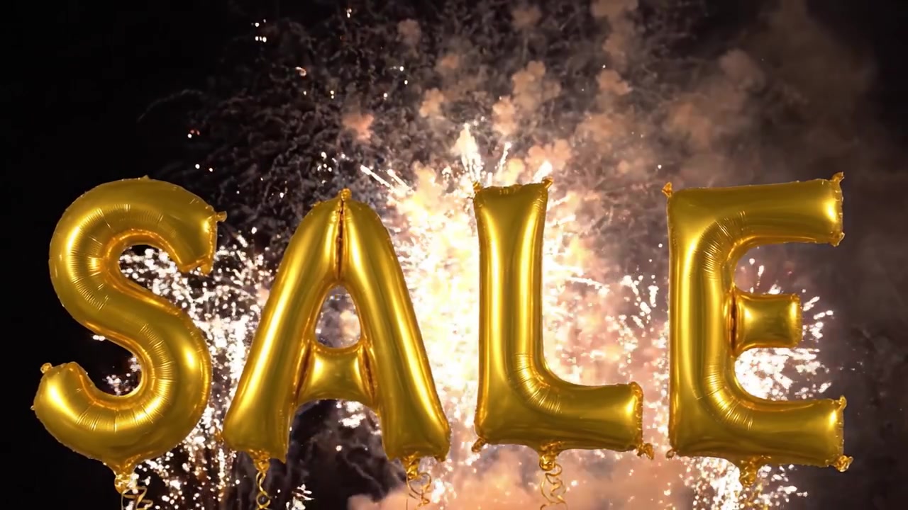 SALDI celebrativi con palloncini dorati e spettacolari fuochi d'artificio sullo sfondo, a significare un'atmosfera festosa e sconti entusiasmanti che attendono i clienti