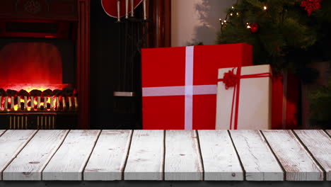 wooden foreground with christmas background of santa with gifts