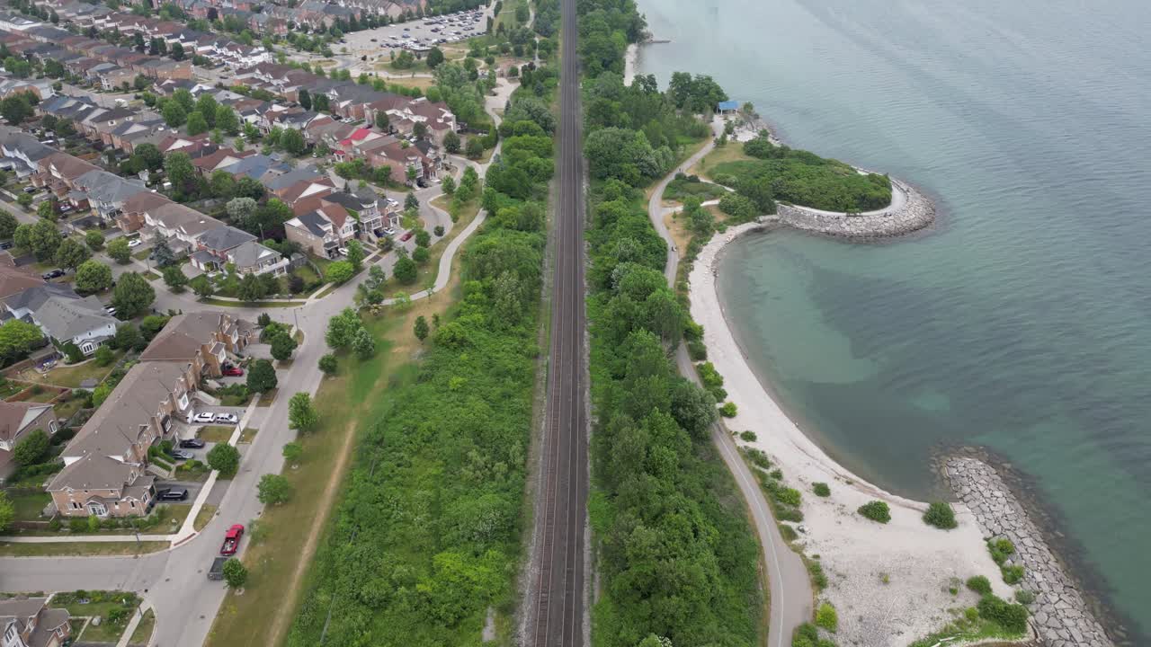 Drone footage of rail tracks cutting through Rouge marshland