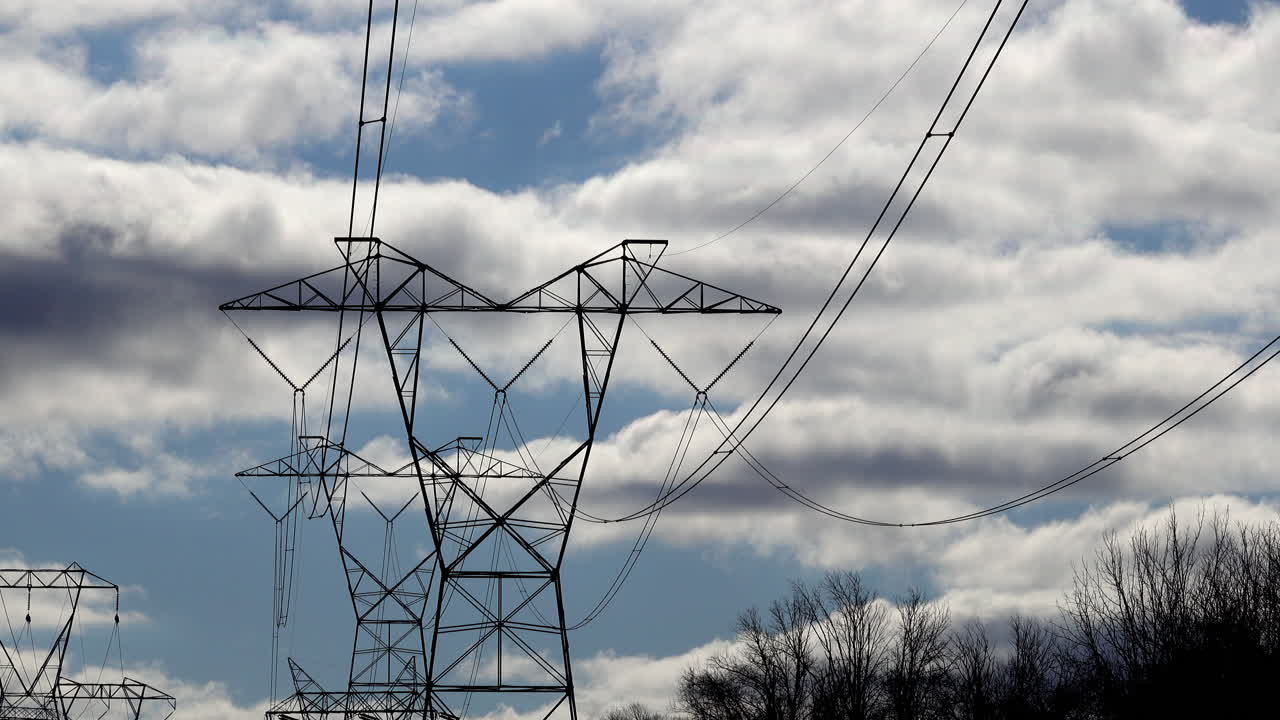 Electrical towers stretch into the distance