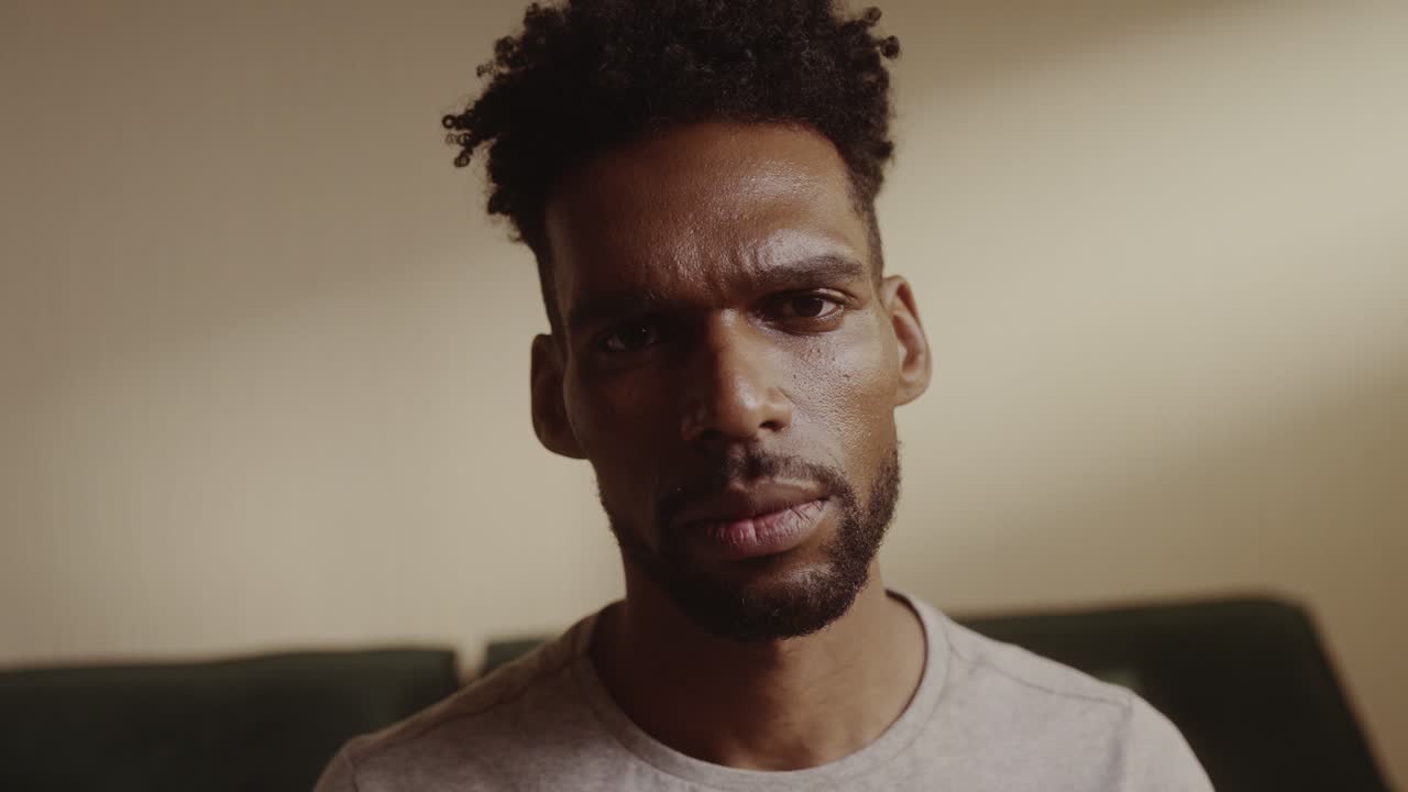 Close-up Portraits of a Man with Varied Expressions