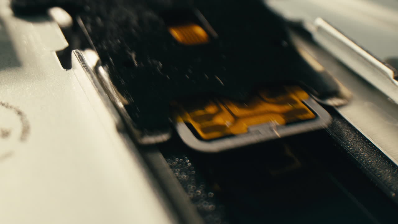 Floppy disc FDD close up, Using diskette for old PC computer macro. Archive programme or Music recorder, playing retro computer games. Vintage device for office, obsolete technology. . High quality 4k footage