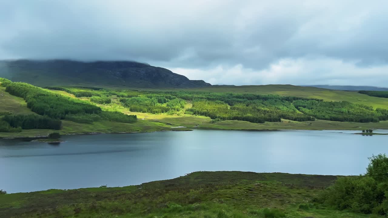 Serene Landscape Of Scottish Highlands On A Cloudy Day. Panning Shot