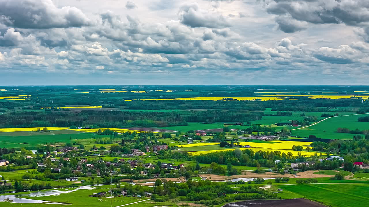 Picturesque Countryside Town Under Sky With Passing Cloudscape. Timelapse