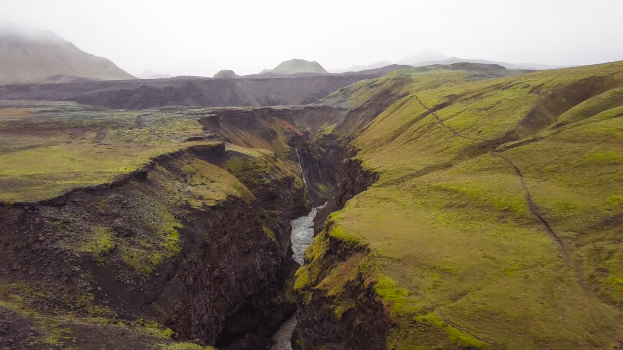 Icelandic Valley with Waterfall
