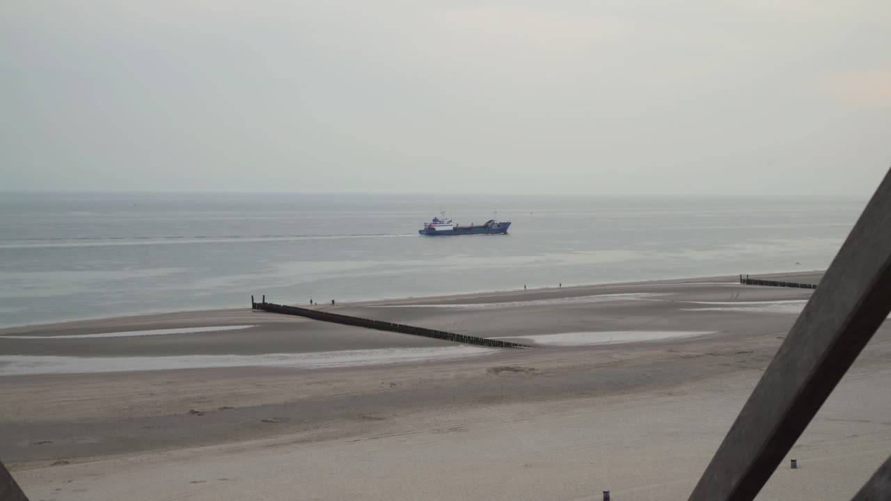 Beautiful view from stairs on Zoutelande beach, Zeeland, Holland, 4K, UHD.