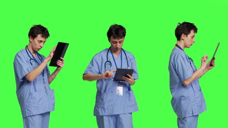 medical assistant browsing online webpages on tablet and texting