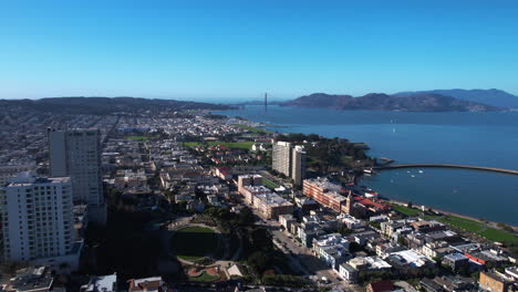 Aerial-View-of-San-Francisco-Bay,-Russian-Hill-Neighborhood,-Fort-Mason-and-Golden-Gate-Bridge-in-Skyline