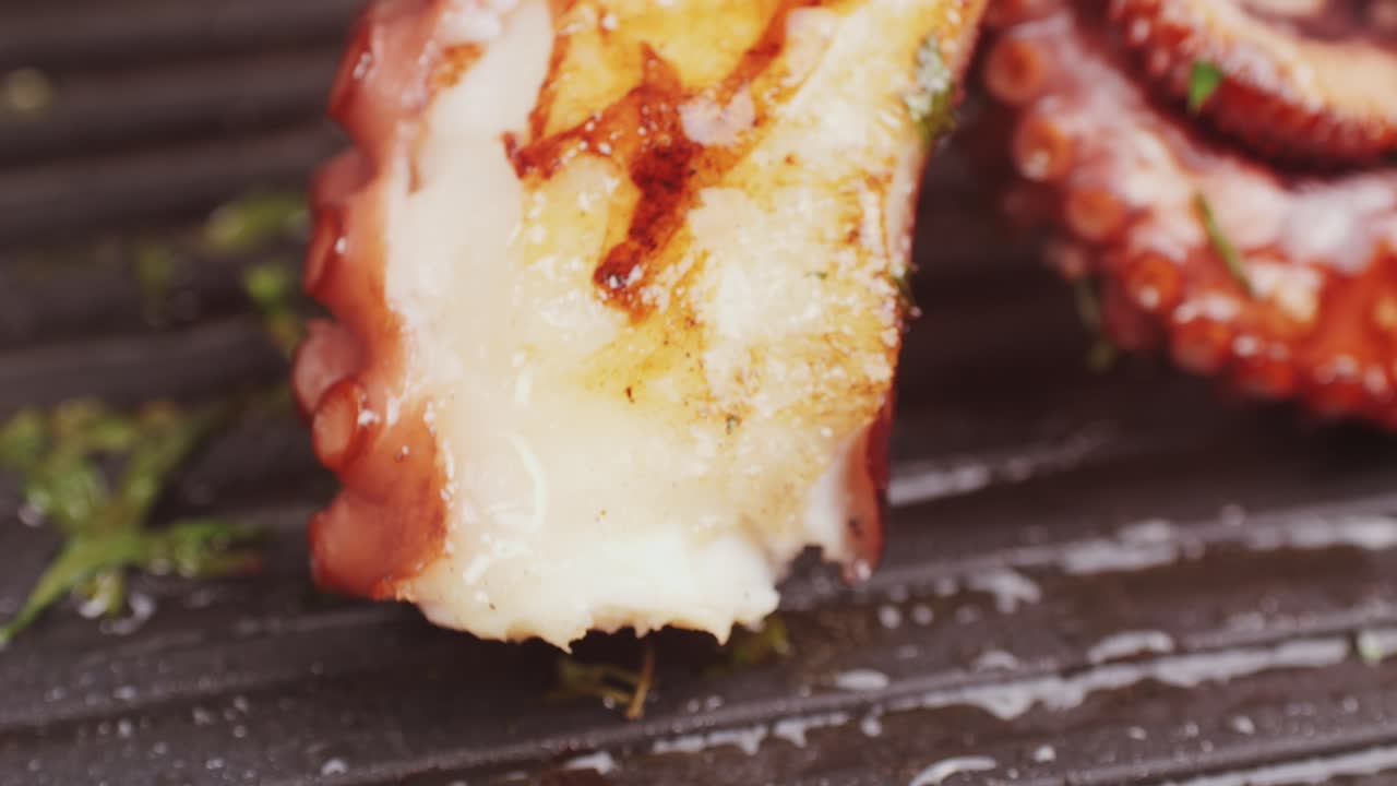 Octopus cooking, chef grill fresh octopus galician style on restaurant kitchen, healthy food, seafood cafe in spain, traditional asian japanese spanish and mediterranean dish.