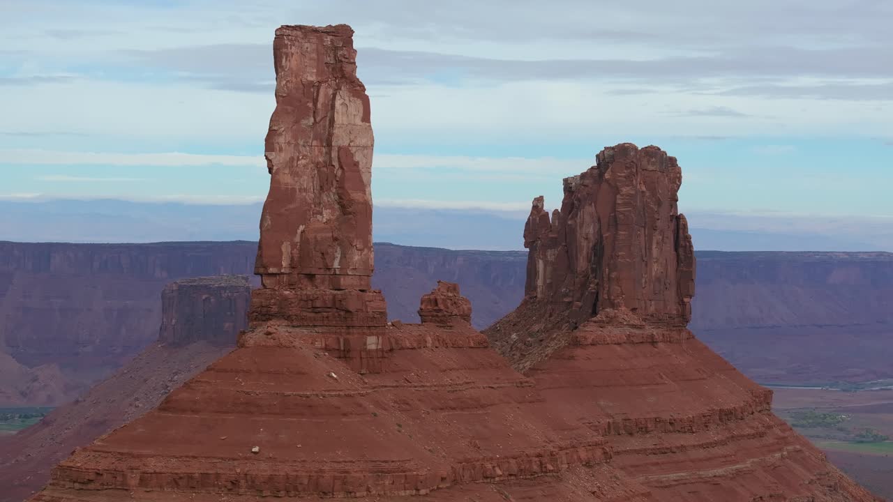 Castle Valley towers under a vast sky exuding solitude and natural wonder