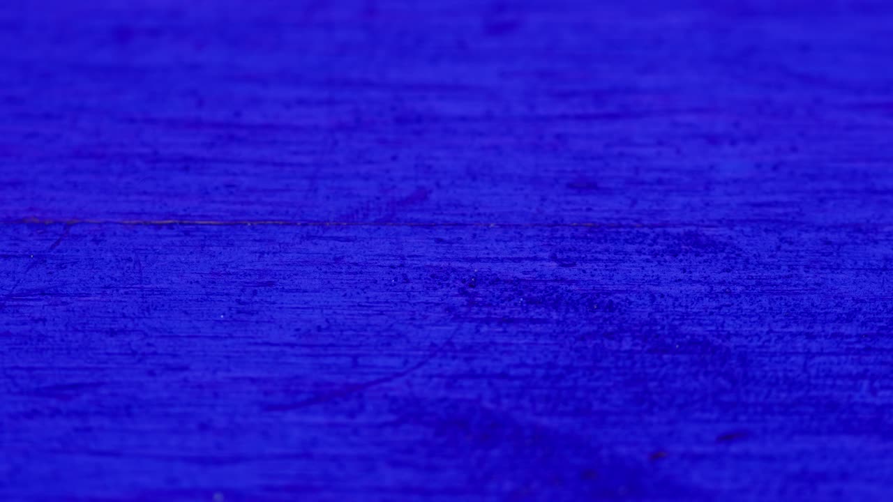 Close-up of a painted blue wooden surface