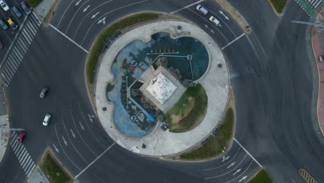 aerial top down shot rising over monument of the spanish in buenos aires at dusk