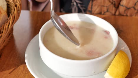 turkish et suyu soup with lemon and bread