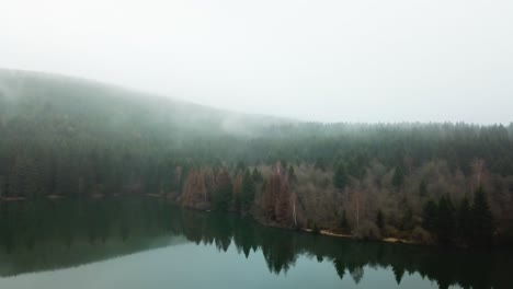 drone video of a foggy lake in germany in 4k