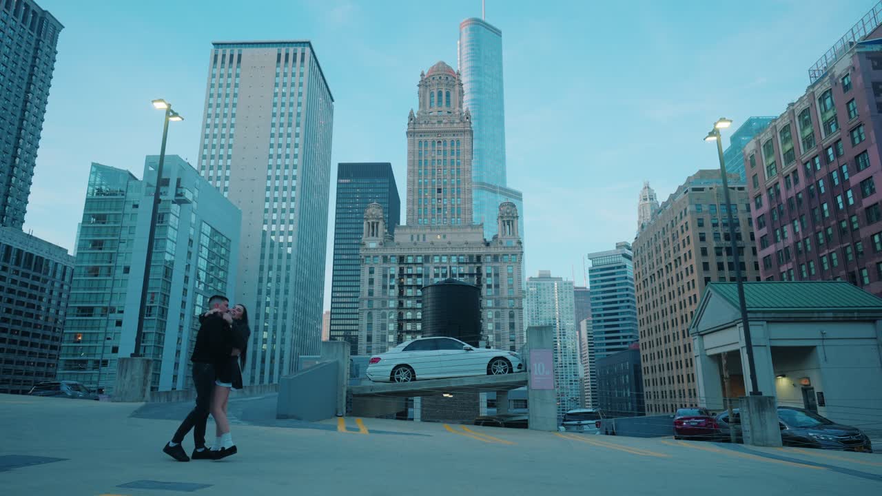 Young Couple Dancing on Rooftop in Chicago with Cityscape — Dreamy Family Future