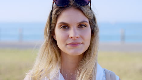 woman, serious face and portrait on beach