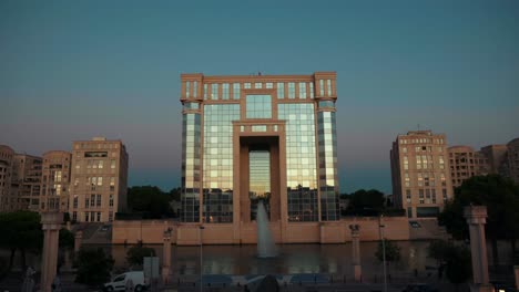walk closer to the building in the night