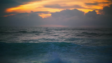 waves rolling early morning seashore. breathtaking seascape horizon at cloudy