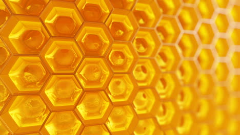 Endless-animation-showing-the-infinite-honeycomb-filled-with-honey.-Closeup-at-delicious-sweet-substance-in-its-original-container.-Physical-accurate-material-with-immersive-reflections.-Loopable.-HD