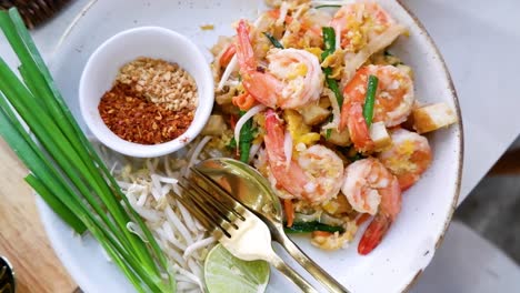 colorful pad thai dish with fresh ingredients