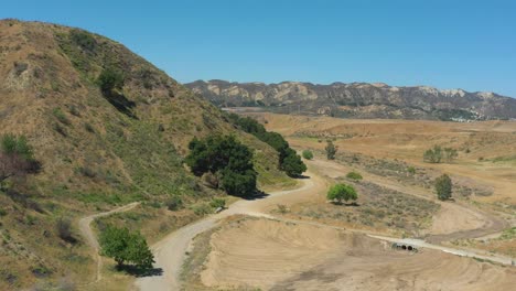 an aerial view over charlie canyon in castaic, california.