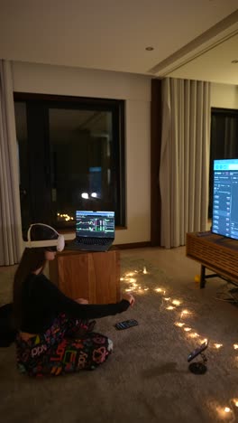 woman using vr headset in a living room while looking at trading charts.