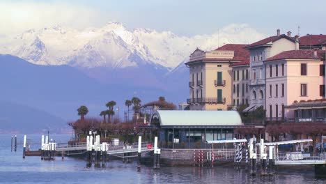 the shores of lake como with the town of bellagio and the italian alps in background 2