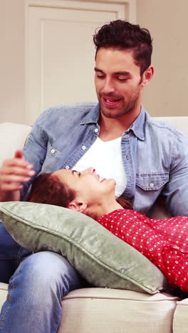 young couple relaxing on sofa