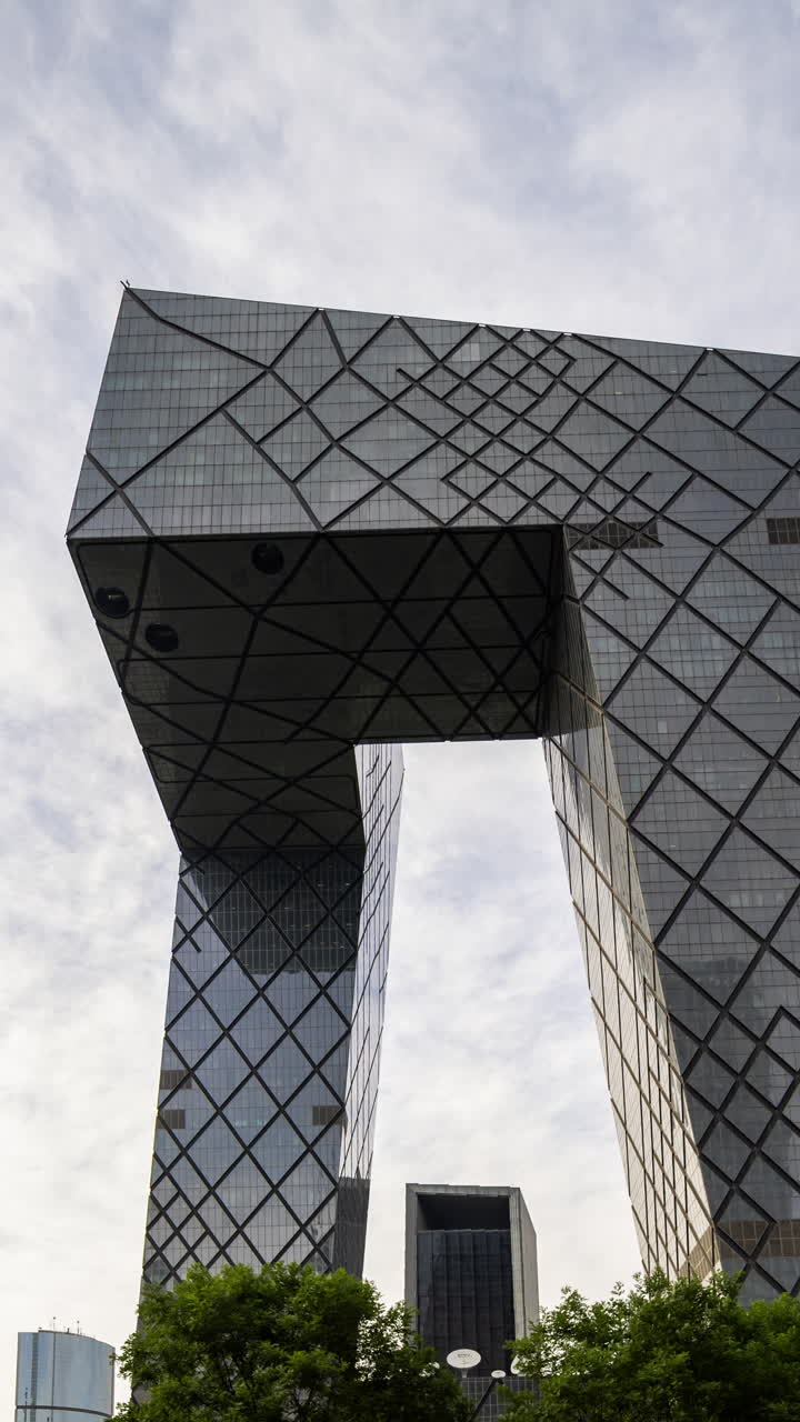 Timelapse of the Beijing city skyline from a high vantage point in vertical
