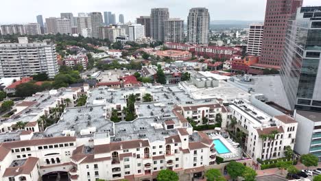 aerial view over westwood neighborhood buildings, los angeles california