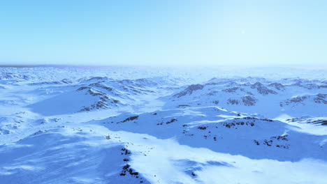 snow-covered mountains in a vast, frozen landscape