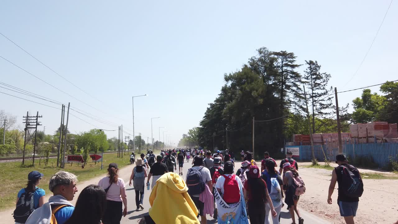 Procession of People walk towards Our Lady Virgin of Lujan Basilica catholic ceremonial religious day in Buenos Aires Argentina