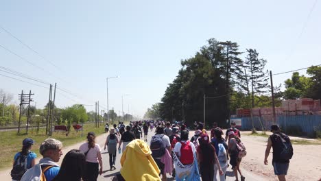 procession of people walk towards our lady virgin of lujan basilica catholic ceremonial religious day in buenos aires argentina