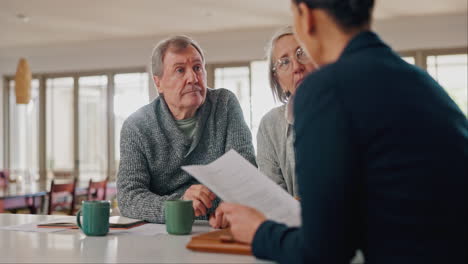 senior couple, lawyer and documents