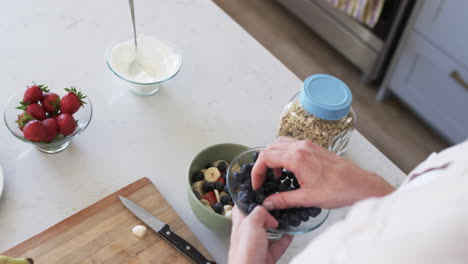 Middle-aged-Caucasian-woman-prepares-a-healthy-breakfast-at-home