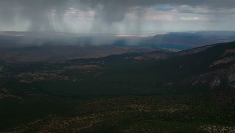 raining lands end hill climb grand mesa grand junction colorado aerial drone summer morning clouds thunderstorm rain sunny western slopes delta montrose olathe shade dark forward motion