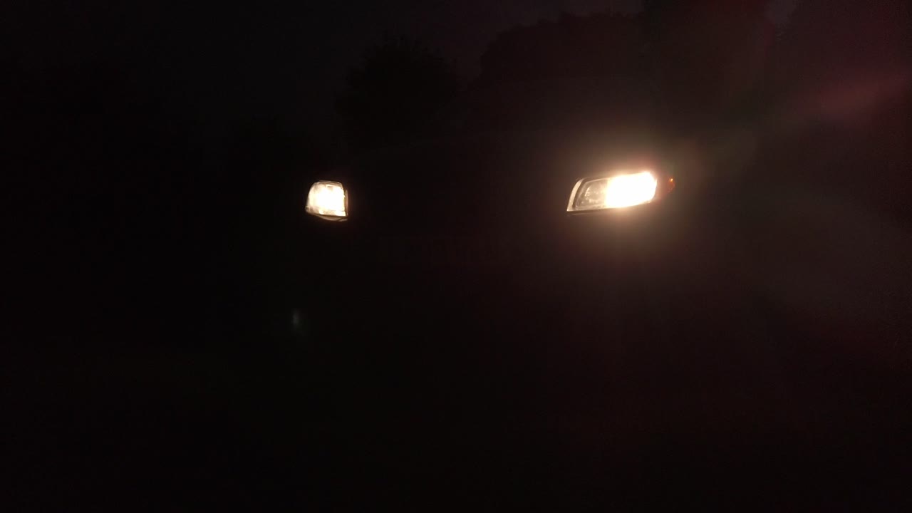 Car head lamps turn off in pitch black dark